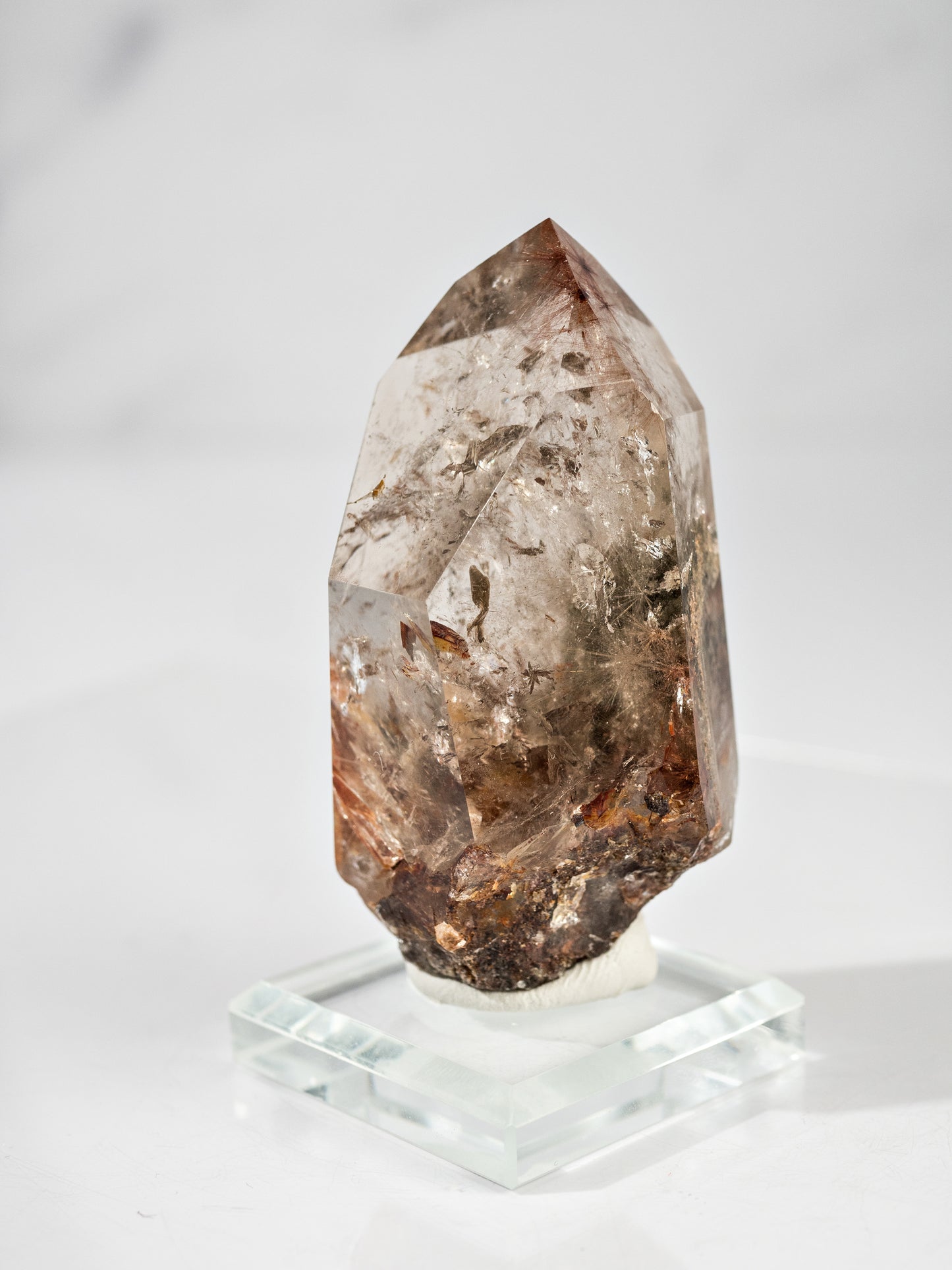 Red Rutile and Inclusion Semi-polished Point